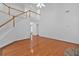 Open living room features hardwood floors and a grand staircase at 3957 Marquette Nw Way, Kennesaw, GA 30144