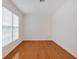 Bright office space with hardwood floors, a large window with blinds, and freshly painted white walls at 3957 Marquette Nw Way, Kennesaw, GA 30144