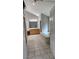 Bathroom featuring double vanity, large mirror, soaking tub, and tile flooring at 2819 Heritage Oaks Cir, Dacula, GA 30019
