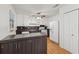 Kitchen with hardwood floors, white cabinets and stainless-steel appliances at 3123 Deshong Dr, Stone Mountain, GA 30087