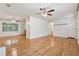 Bright living area with hardwood floors and two ceiling fans at 3123 Deshong Dr, Stone Mountain, GA 30087