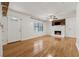 Spacious living room with hardwood floors and a cozy fireplace at 3123 Deshong Dr, Stone Mountain, GA 30087