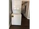 Convenient in-unit laundry setup with a stacked washer and dryer, maximizing space and adding ease to daily living at 499 Oak Way, Lawrenceville, GA 30046