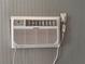 Wall-mounted window air conditioner unit, providing efficient and localized climate control for comfortable living at 499 Oak Way, Lawrenceville, GA 30046