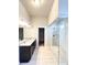 Bright bathroom with a double sink vanity, large glass enclosed shower, and modern finishes at 2300 Ivy Birch Ln, Buford, GA 30519