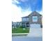 Charming two-story home with a well-manicured lawn and a two-car garage at 2300 Ivy Birch Ln, Buford, GA 30519