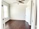 Bright, open room with a ceiling fan, perfect for an office or den at 2300 Ivy Birch Ln, Buford, GA 30519