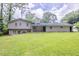 Large, well-maintained backyard with a brick home exterior, great for entertaining or relaxing at 3030 Golden Dr, Atlanta, GA 30344