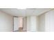 Bright basement area, featuring plush carpet, neutral walls, and white doors at 3030 Golden Dr, Atlanta, GA 30344