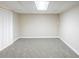 Neutral carpet and painted walls of a finished basement offers a versatile space at 3030 Golden Dr, Atlanta, GA 30344