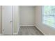 Bedroom features a closet, carpet flooring, and natural light from the window at 3030 Golden Dr, Atlanta, GA 30344