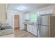 Modern kitchen featuring stainless steel appliances and granite countertops at 3030 Golden Dr, Atlanta, GA 30344