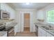 Modern kitchen featuring stainless steel appliances and granite countertops at 3030 Golden Dr, Atlanta, GA 30344