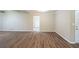 Bright living room featuring wood floors, large windows, and fresh paint at 3030 Golden Dr, Atlanta, GA 30344