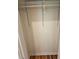 An empty closet provides ample storage in this home with a simple wire rack at 1497 Elizabeth Ln, East Point, GA 30344