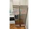 Stainless steel french door refrigerator with ice and water dispenser plus microwave at 1497 Elizabeth Ln, East Point, GA 30344