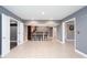 Open basement design with bar seating between two doorways, offers flexible space at 2625 Morningside Nw Trl, Kennesaw, GA 30144