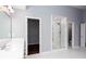 Bathroom with glass shower and access to the walk-in closet at 2625 Morningside Nw Trl, Kennesaw, GA 30144