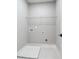 Empty Laundry Room featuring new tile floor and new hookups at 419 Crestmont Ln, Canton, GA 30114