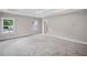 Large main bedroom with plush carpet and abundant natural light at 419 Crestmont Ln, Canton, GA 30114