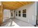 Covered patio area with space for outdoor seating at 419 Crestmont Ln, Canton, GA 30114