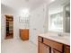 Bright bathroom with double vanity, walk in closet, and garden tub at 5025 Bishops Row Row, Austell, GA 30106
