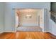 View of dining room with grey carpet, white trim, wainscoting, and chandelier lighting at 5025 Bishops Row Row, Austell, GA 30106