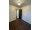 Simple bedroom featuring wood floors and a modern color scheme at 535 Walnut St, Hapeville, GA 30354