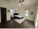 Comfortable bedroom with natural light, a ceiling fan, and neutral decor at 535 Walnut St, Hapeville, GA 30354