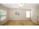 Large bedroom with tray ceiling and ensuite bathroom access at 555 Flintlock Dr, Dacula, GA 30019
