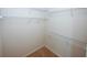 Walk-in closet with ample white shelving for storage and organization at 555 Flintlock Dr, Dacula, GA 30019