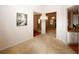 Dining room with chandelier open to living spaces, showcasing a modern floor plan at 555 Flintlock Dr, Dacula, GA 30019