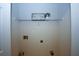 Functional laundry room with shelving and necessary connections for laundry appliances at 555 Flintlock Dr, Dacula, GA 30019