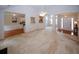 Spacious living area with fireplace and a view of the entryway and kitchen at 555 Flintlock Dr, Dacula, GA 30019