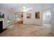 Bright living room area with fireplace and view to dining and kitchen at 555 Flintlock Dr, Dacula, GA 30019