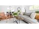 Bright living room with hardwood floors, modern furnishings, and ample natural light at 138 Woodlawn Ave, Decatur, GA 30030
