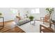 Cozy living room featuring modern furniture, a plush rug, and bright windows at 138 Woodlawn Ave, Decatur, GA 30030