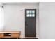 The entryway features a modern paneled door, and white walls at 205 Maple St, Atlanta, GA 30354