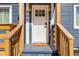 Inviting front door with sidelights and a 'HOME' welcome mat at 205 Maple St, Atlanta, GA 30354
