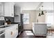 Modern kitchen with stainless steel appliances and hardwood floors at 205 Maple St, Atlanta, GA 30354