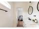 Modern bathroom featuring double sinks and a glimpse of the bedroom at 3198 Oakdale Rd, Atlanta, GA 30354