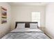 Comfortable bedroom featuring modern decor, cozy bedding, and neutral color palette at 3198 Oakdale Rd, Atlanta, GA 30354