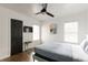 Bright bedroom featuring natural light, wood floors, neutral paint, and a ceiling fan at 3198 Oakdale Rd, Atlanta, GA 30354