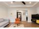 Cozy living room featuring modern decor, hardwood floors and unique touches at 3198 Oakdale Rd, Atlanta, GA 30354