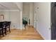 Welcoming foyer with gleaming hardwood floors, tall ceilings, and grand staircase at 4825 Whispering Pine Way, Cumming, GA 30028