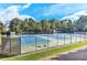 Enjoy a game of tennis on the community's well-maintained courts, perfect for friendly competition and exercise at 4825 Whispering Pine Way, Cumming, GA 30028