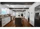 Bright, open kitchen featuring white cabinets, a large island, and stainless steel appliances at 1045 Moreland Se Ave, Atlanta, GA 30316