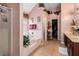 Well-lit bathroom with a separate shower, garden tub, and ample storage in the vanity and linen closet at 11961 Markham Way, Hampton, GA 30228