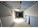 Unfinished basement showcasing exposed ceiling and wall framing, ready for customization at 1553 Smithson Ct, Lithonia, GA 30058
