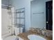 Bathroom featuring a granite vanity countertop and shower/tub combination at 1553 Smithson Ct, Lithonia, GA 30058